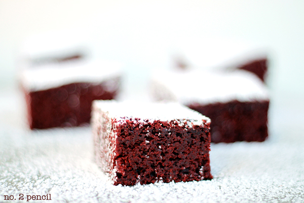 red velvet brownie dusted with powdered sugar