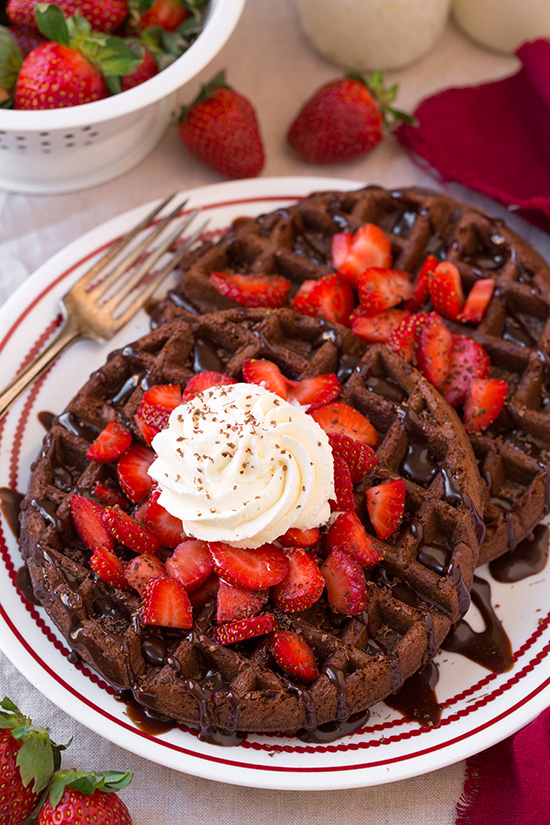 chocolate waffles with strawberries and cream