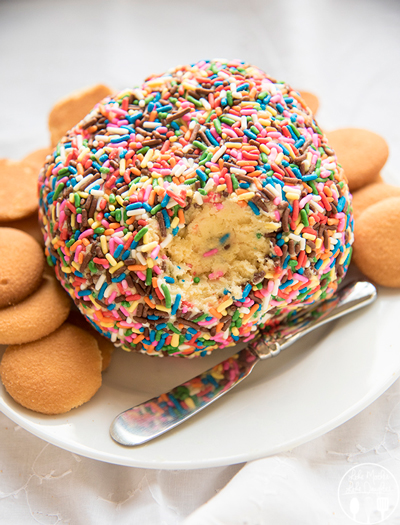 cake batter cheeseball covered in sprinkles with vanilla wafers