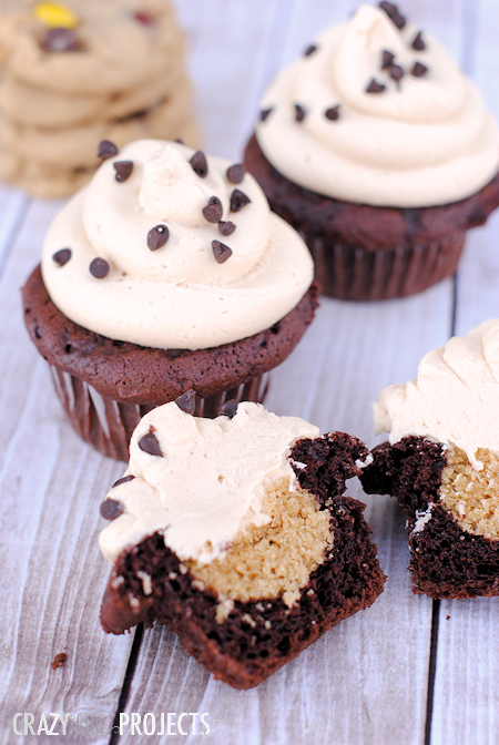 peanut butter cookie dough filled chocolate cupcakes with peanut butter frosting