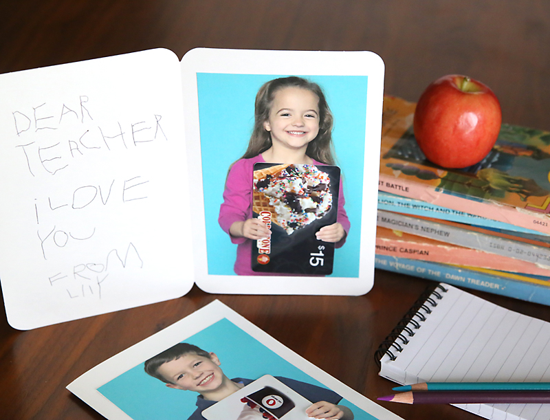 Card for a teacher with photo of student inside holding a gift card