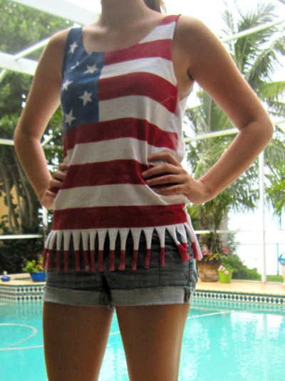 A person wearing a DIY flag tank top