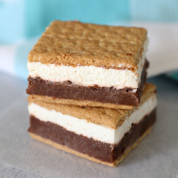 Frozen smores: layers of chocolate pudding and marshmallow creme sandwiched in between graham crackers and frozen!