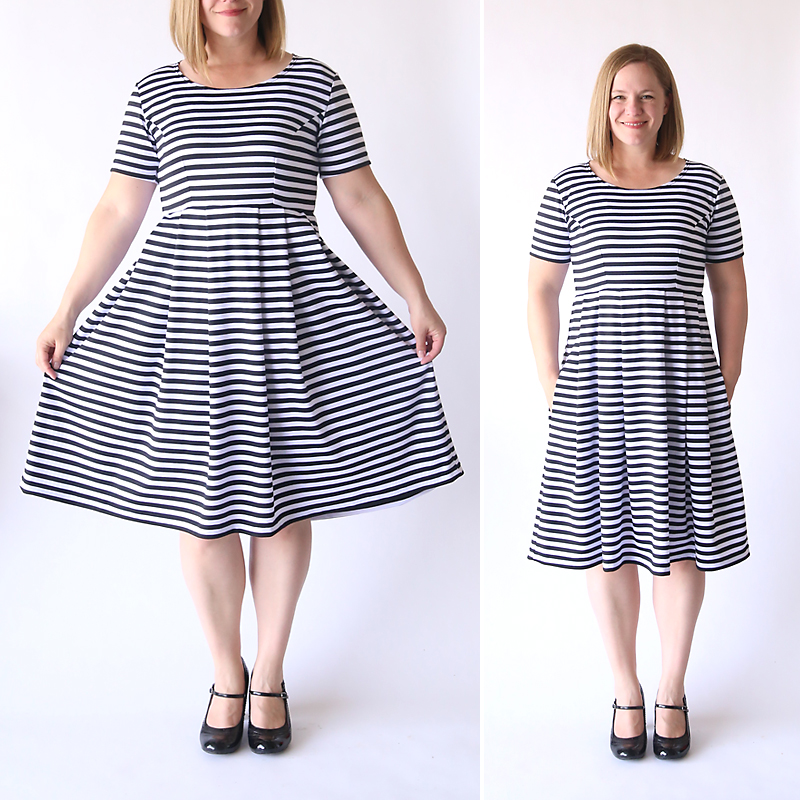 A woman wearing a black and white striped fit and flare dress