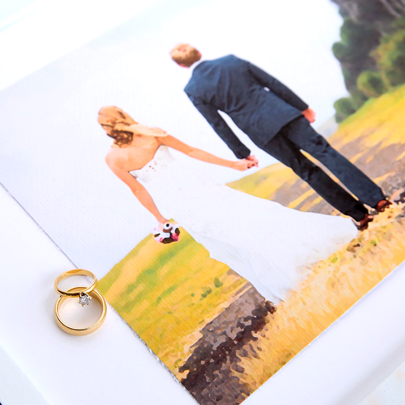 A painting of a bride and groom with wedding rings