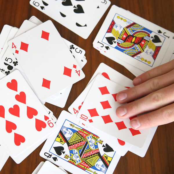 Hands and playing cards