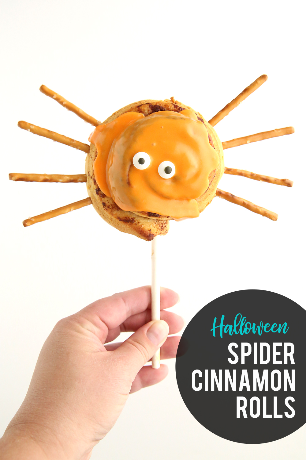 Make easy spider cinnamon rolls for Halloween! Cute idea for breakfast on Halloween.
