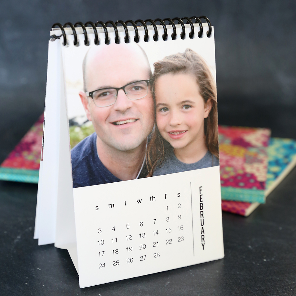 Personalized mini photo calendar bound at the top like a flip book