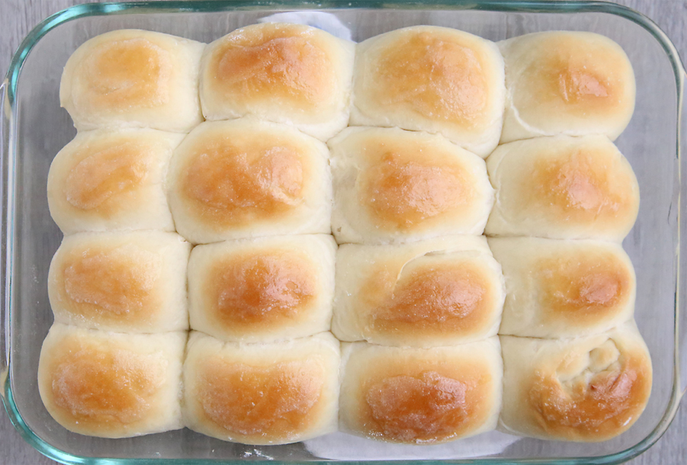 a pan of golden homemade dinner rolls