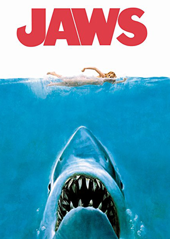 Movie cover for Jaws: A shark under the water while a woman swims above