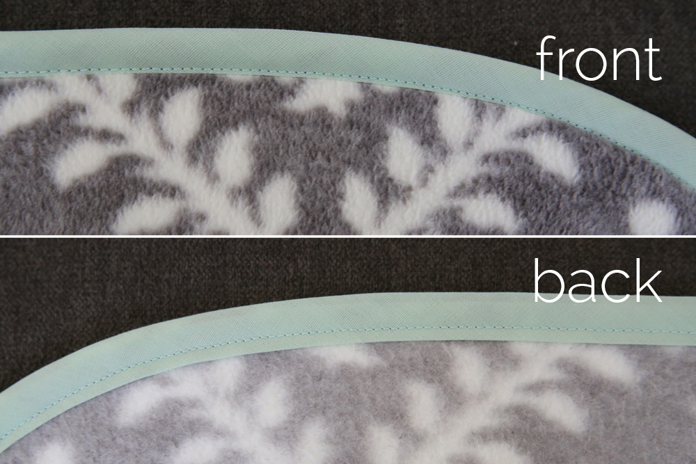 DIY fleece blanket with bias trim, trim is visible on both front and back