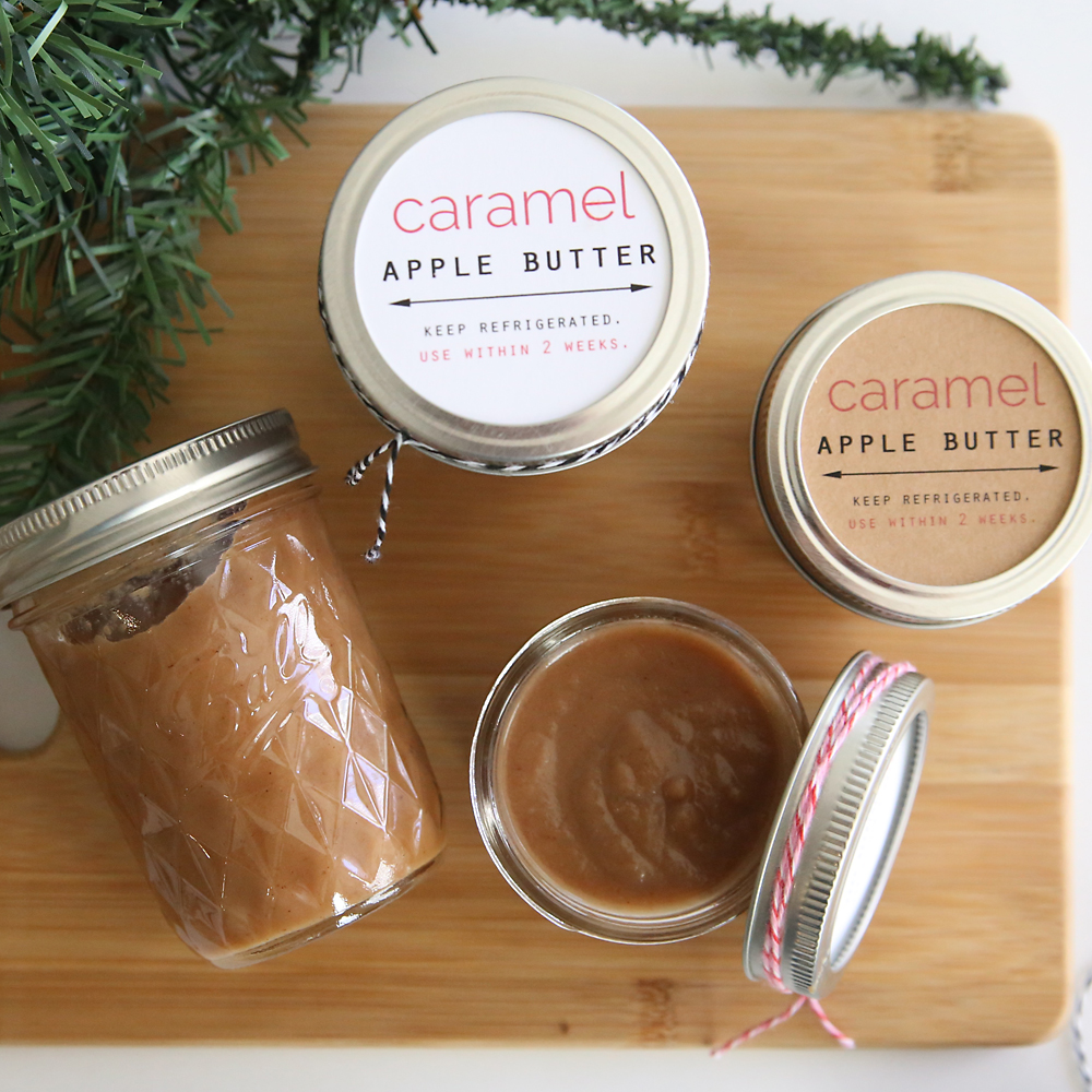 Caramel apple butter in small jars with gift tags