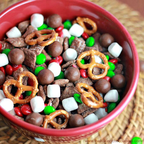 Christmas treat mix with pretzels, marshmallows, and M&Ms in a bowl