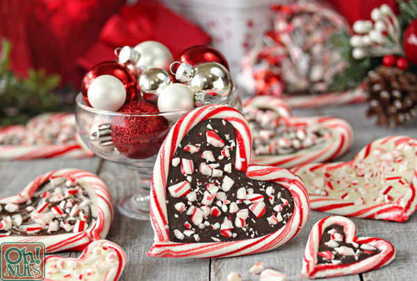 Candy canes forming a heart with chocolate inside them