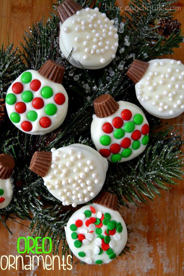 White chocolate dipped Oreos decorated to look like Christmas ornaments