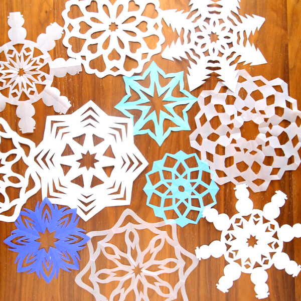 Paper snowflakes in various shapes and sizes