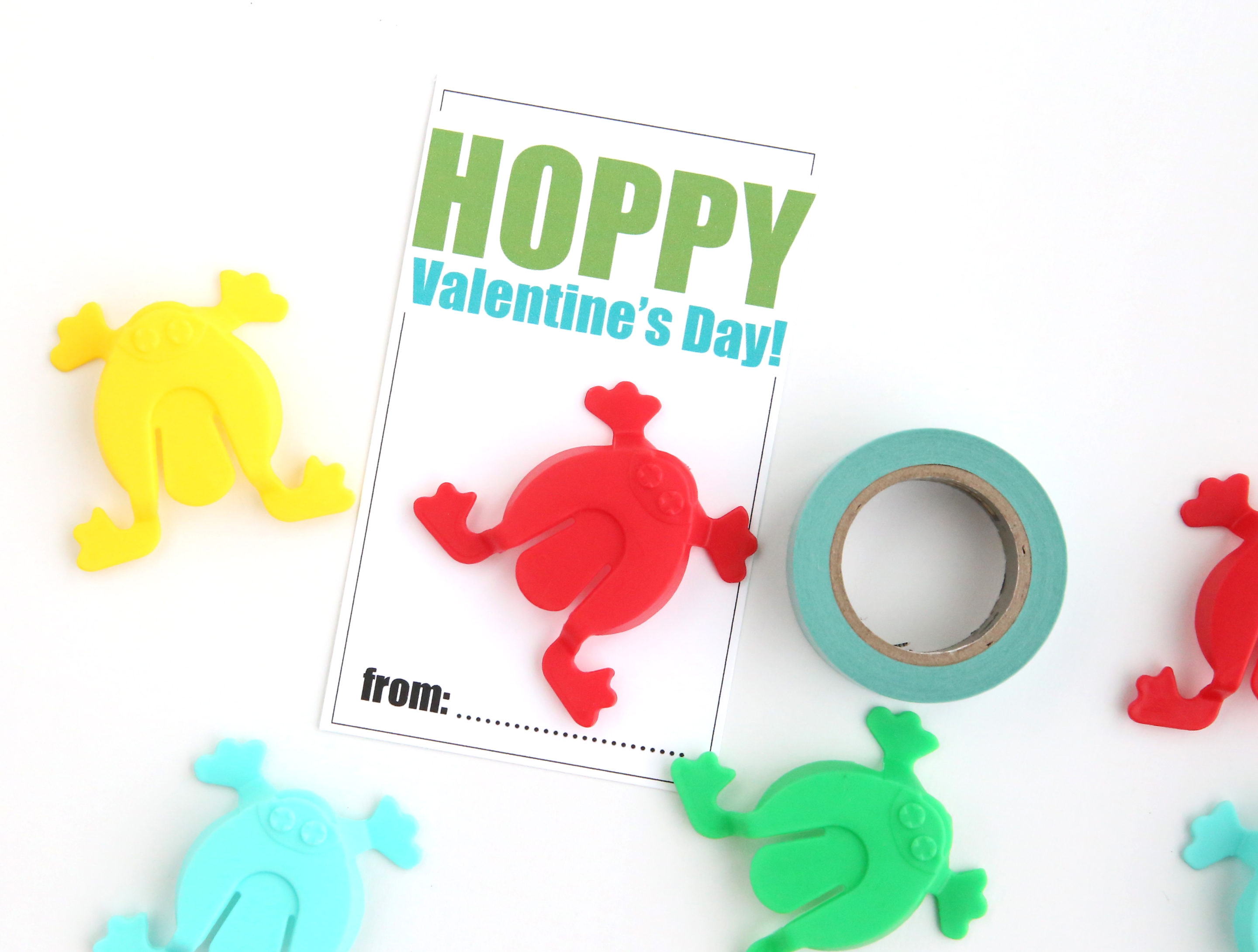 Printable Valentine\'s Day cards that say Hoppy Valentines Day and plastic jumping frog toys