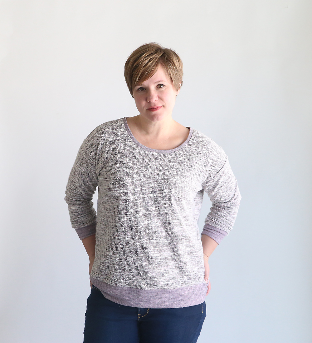 A wearing a light purple slouchy sweatshirt made from a free pdf sewing pattern