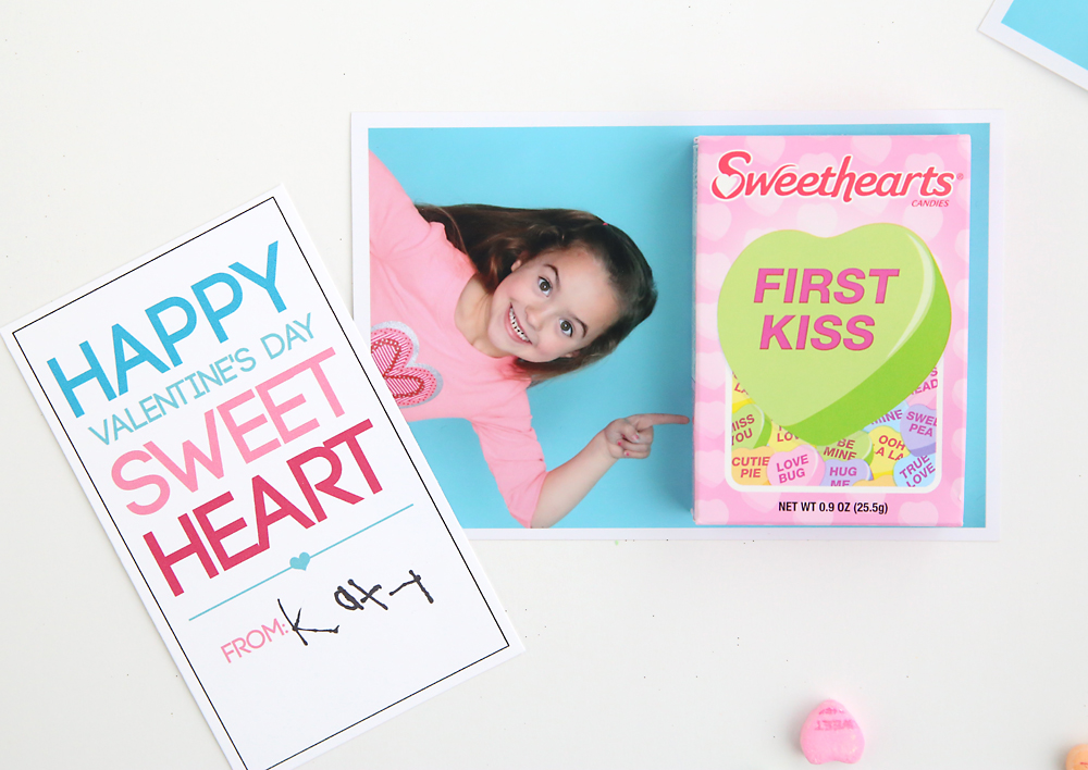 Photo of a little girl pointing up, with box of sweethearts candy glued on and Sweetheart Valentines Day card