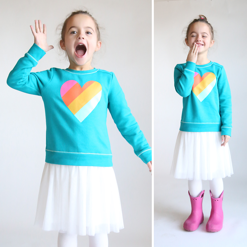 Photo of a girl wearing a dress made by sewing a tulle skirt onto a purchased sweatshirt