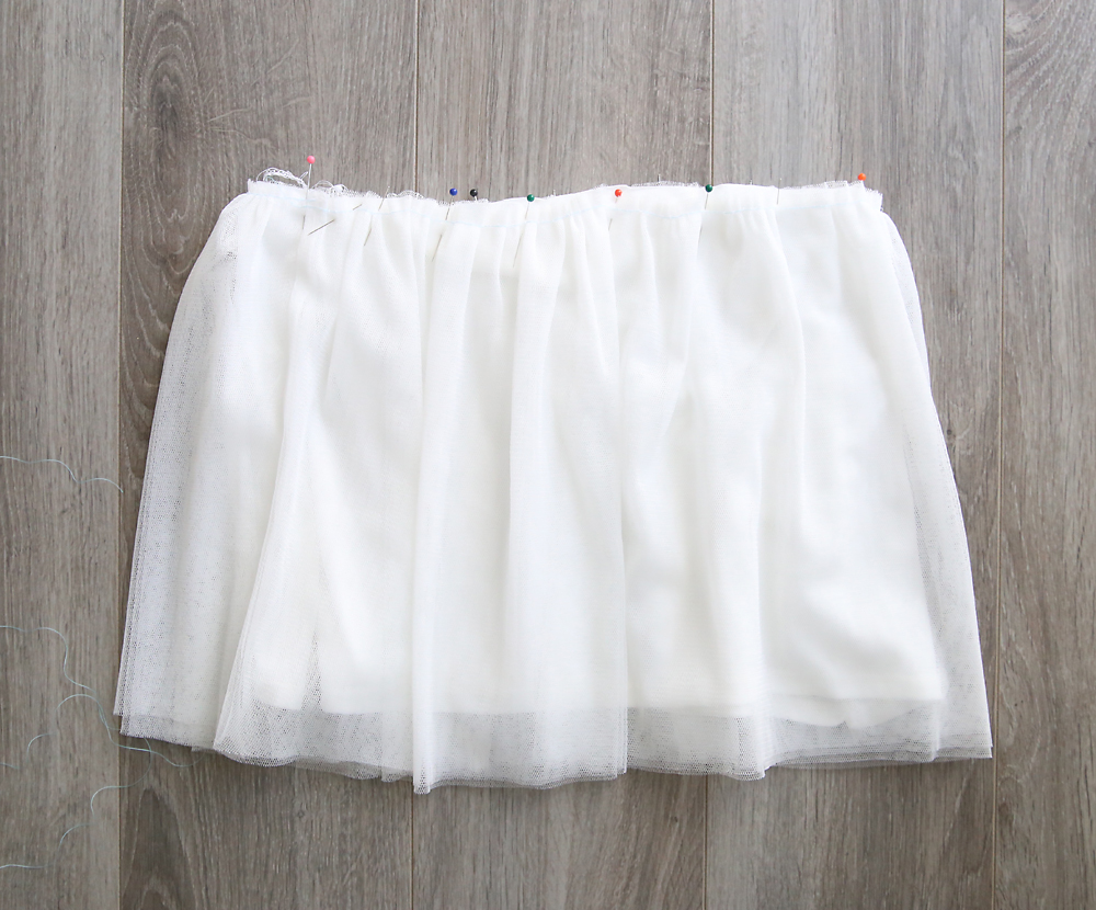 Tulle skirt has been gathered to the same width as the knit underskirt, pinned over the skirt