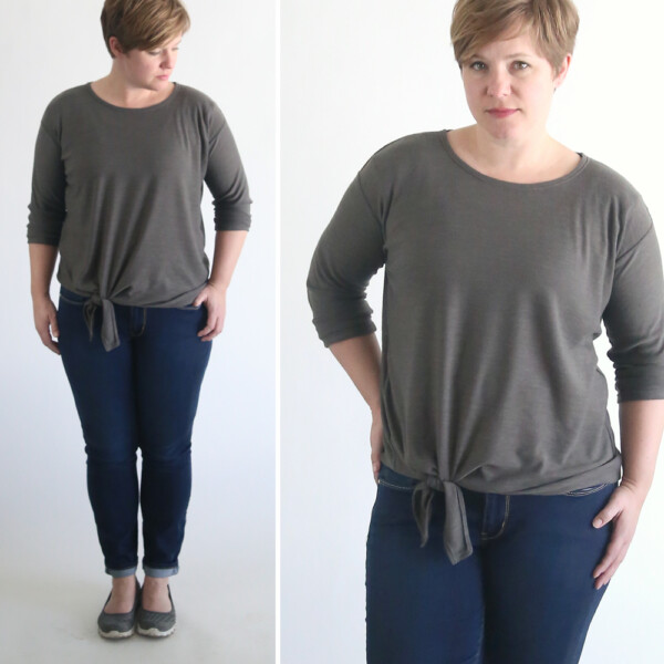 A woman wearing a sweater with a tie front hem made from a free pdf sewing pattern