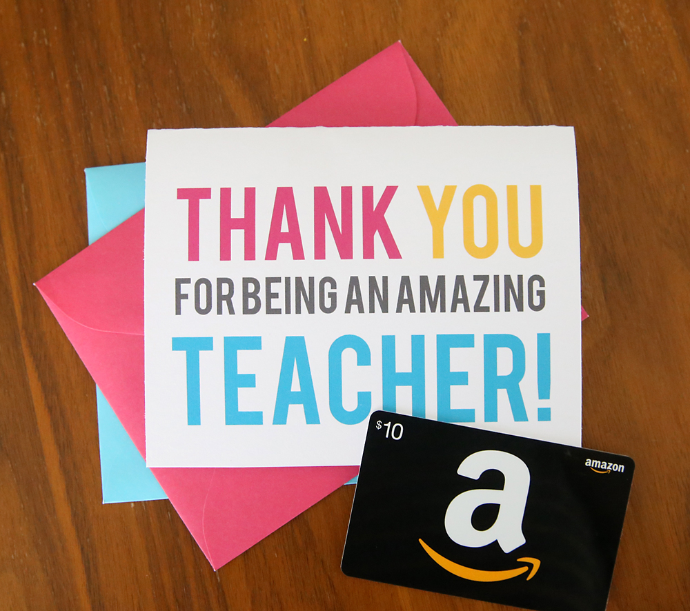 A close up of thank you card for a teacher and an amazon gift card