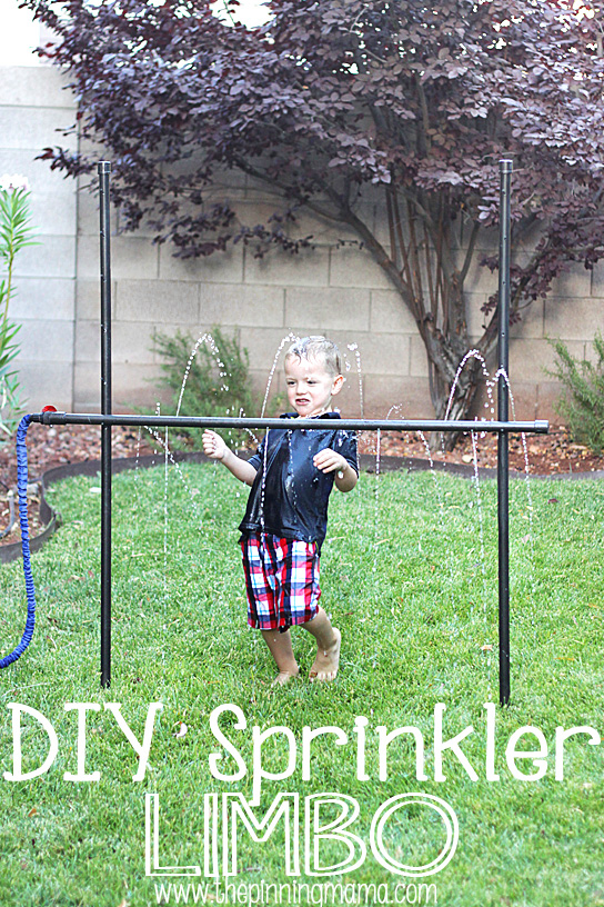 A child playing DIY sprinkler limbo