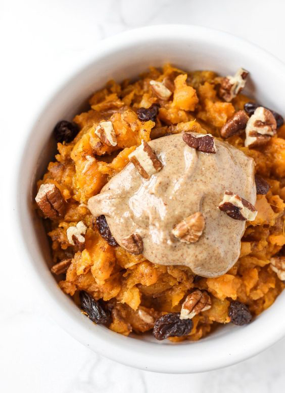 Sweet potato breakfast bowl with chopped nuts