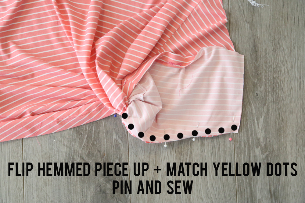 Flip hemmed piece up and match yellow dots; pin and sew