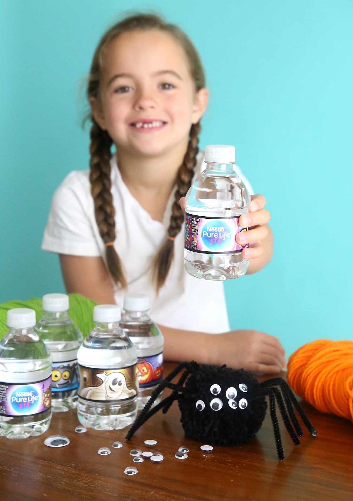 A girl holding a water bottle