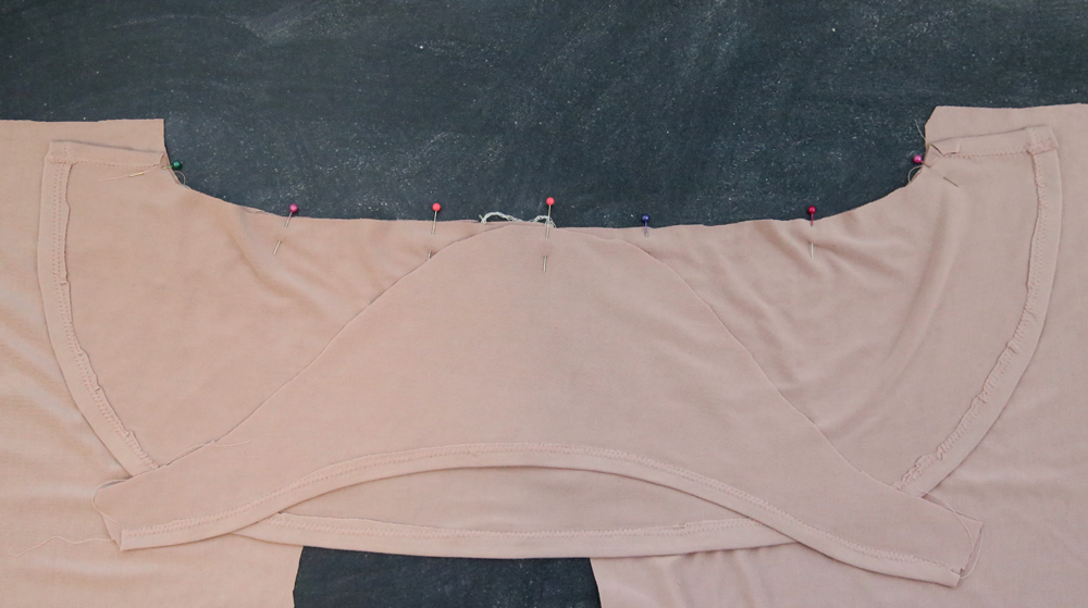 Sleeve piece pinned over flutter sleeve