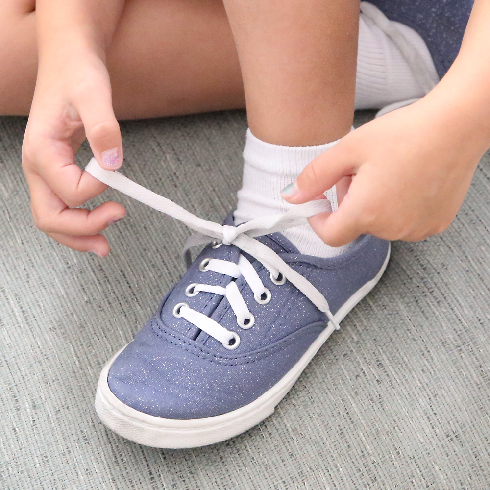 This is the best shoe tying hack ever! Teach your kids the fast and easy way to tie their shoes. It takes about 2 seconds!