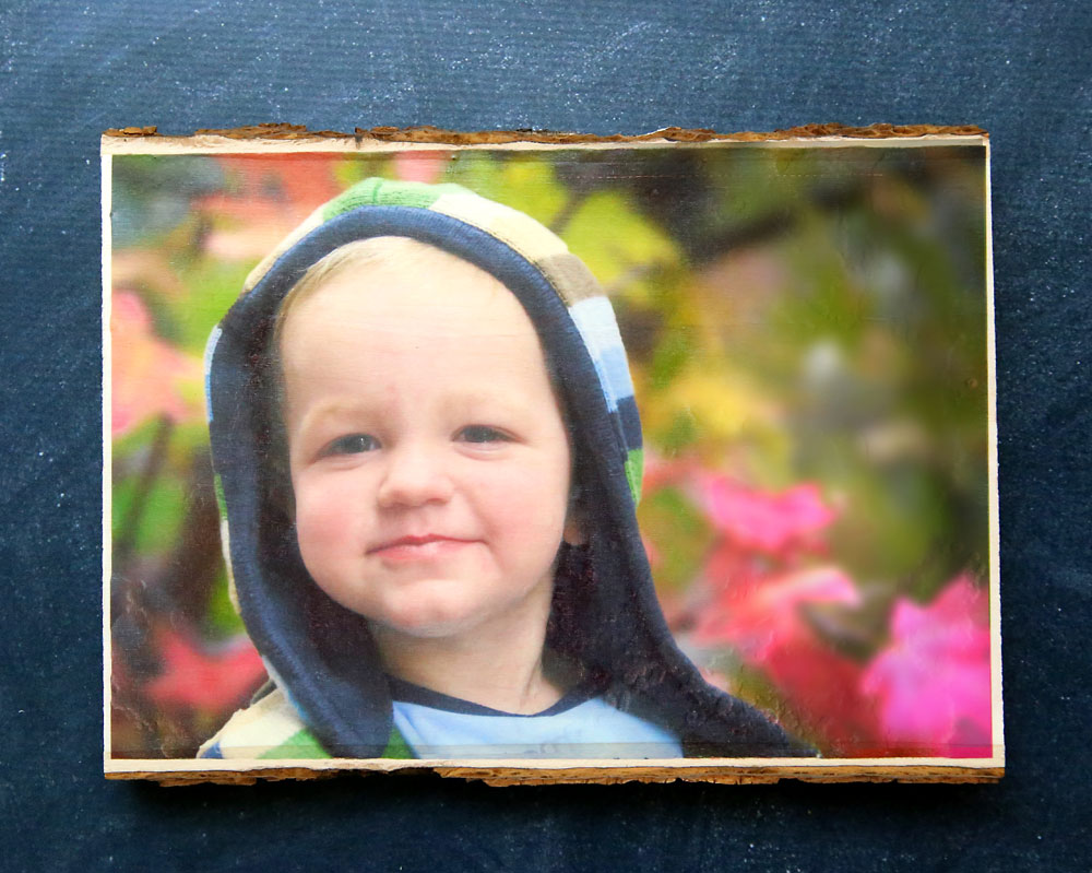 Photo transferred onto wood plank