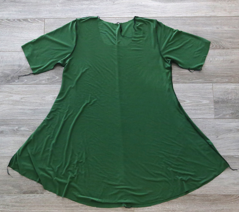Swing tunic with sleeves attached