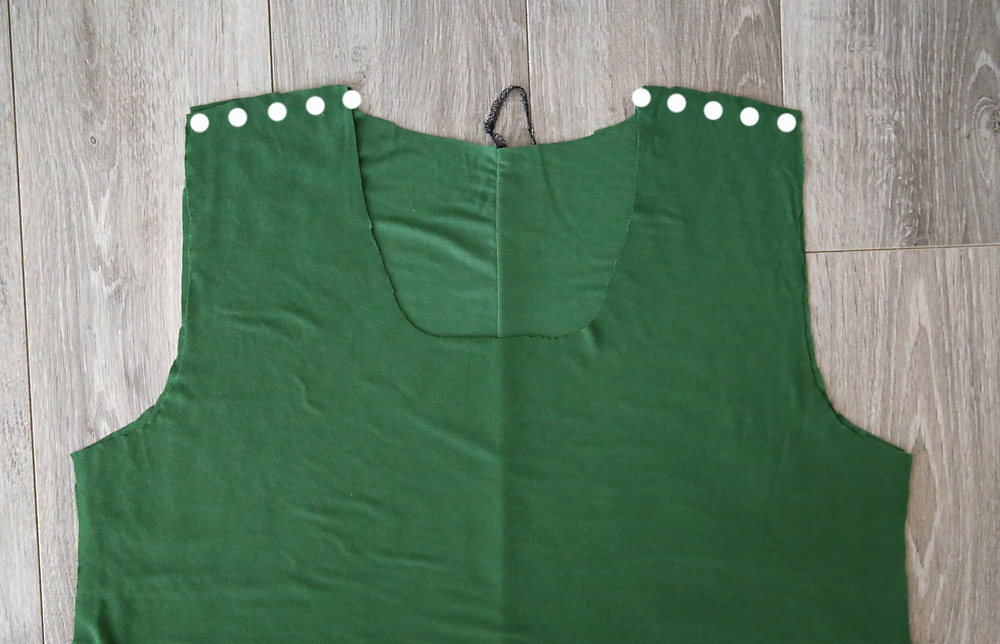Swing tunic front piece laid over back piece with shoulder seams marked