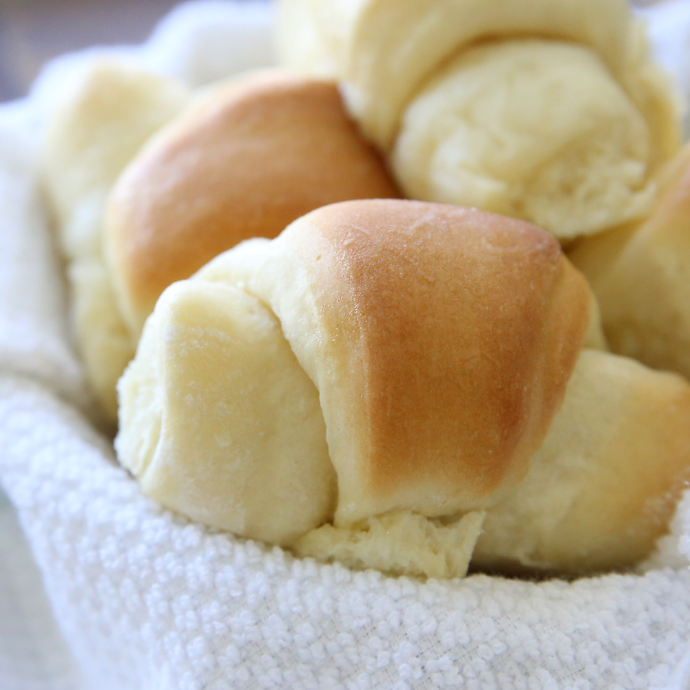 A close up of homemade buttery crescent roll