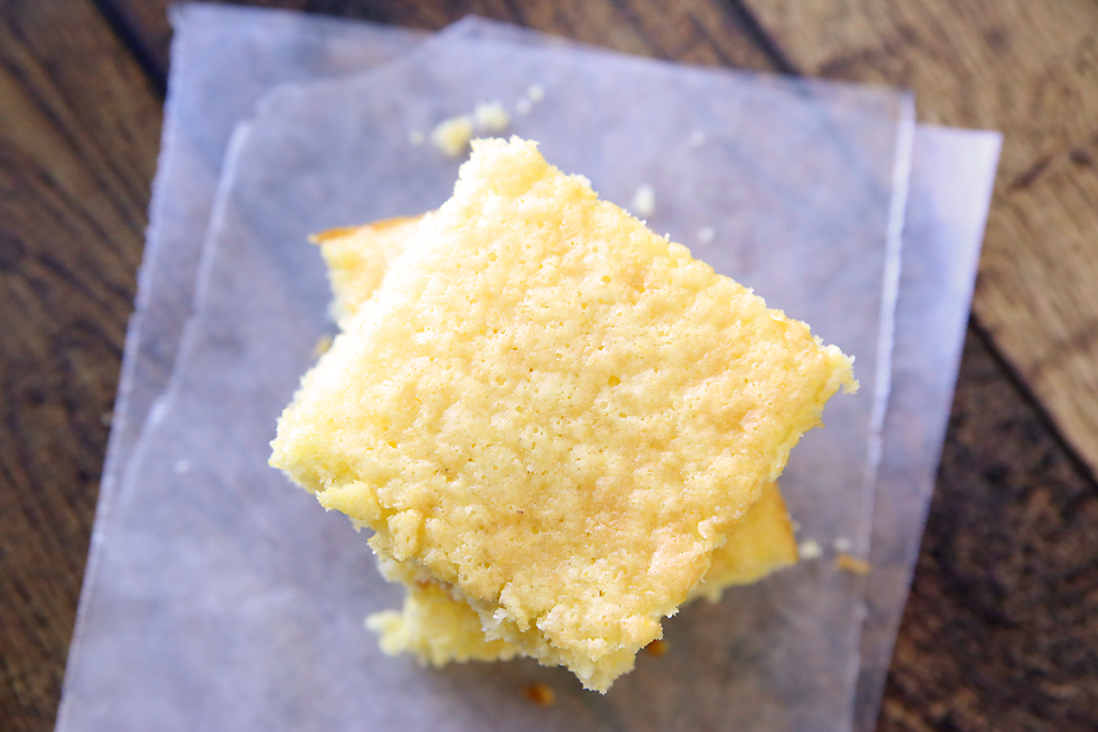 Cornbread pieces on wax paper