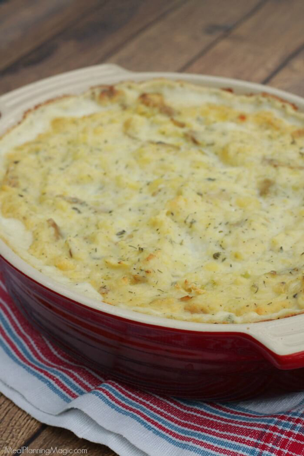 Casserole dish with mashed potatoes in it