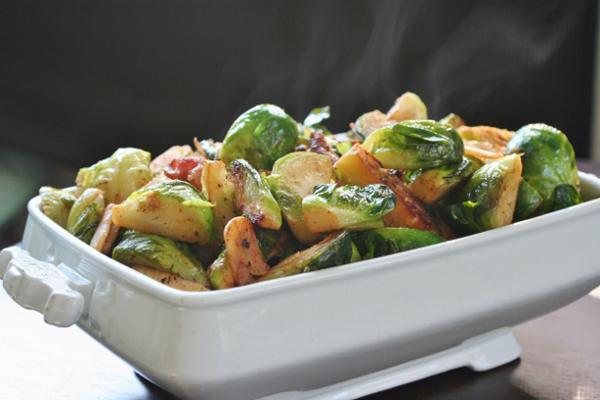 A tray of brussel sprouts with bacon for Thanksgiving