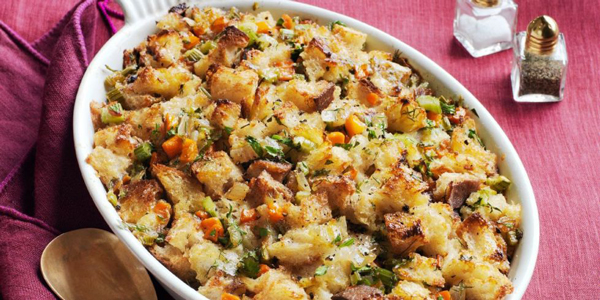 Thanksgiving stuffing in a white serving dish