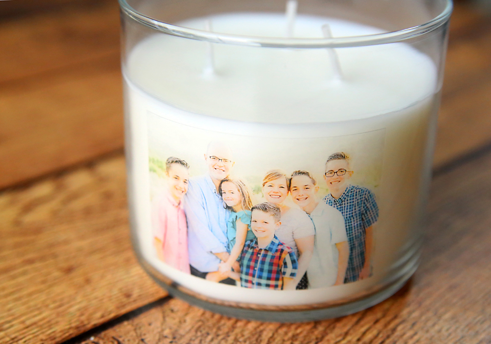 White jar candle with photo on it