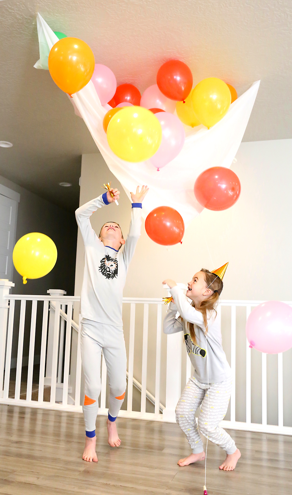 Kids playing with the balloon drop