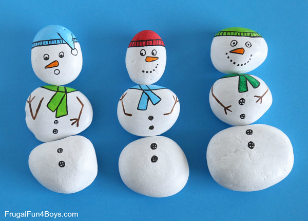 Rocks painted to look like snowmen