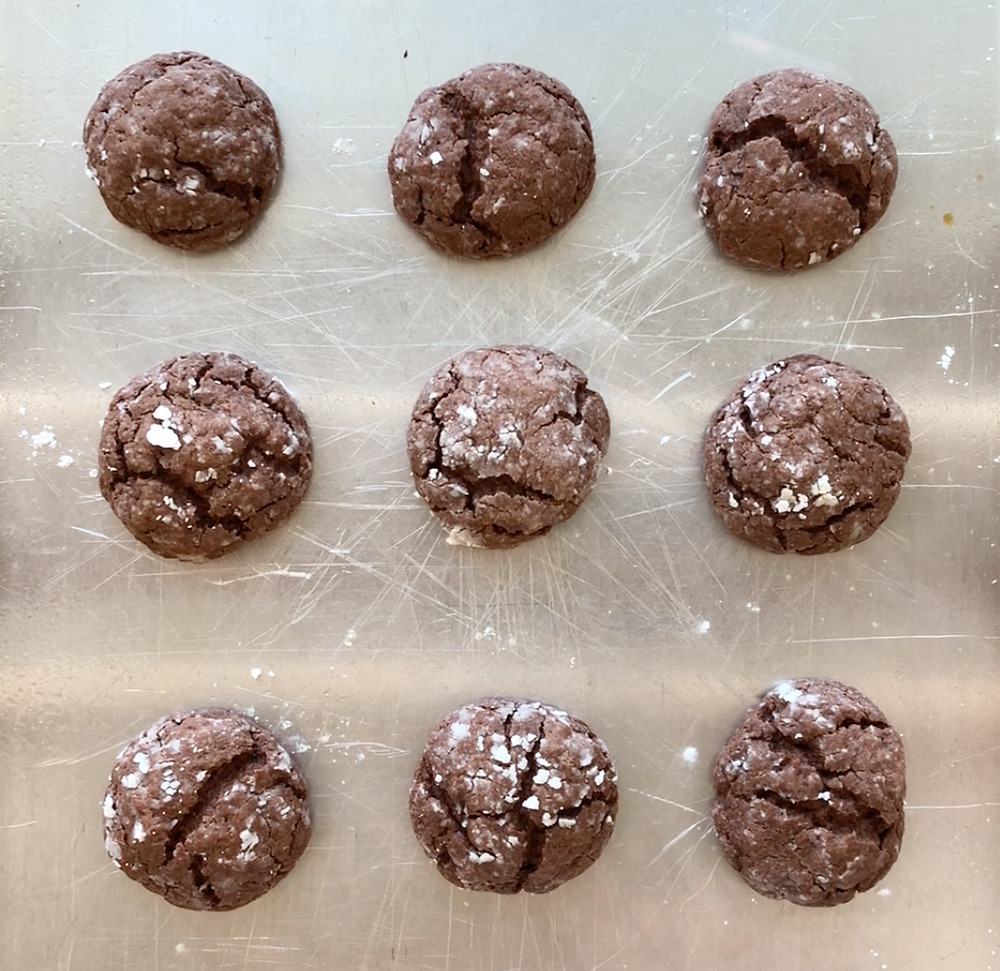 Baked chocolate cookies that have cracked on top