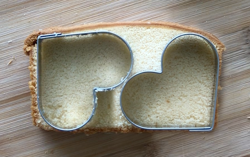 Slice on pound cake with small heart cookie cutters