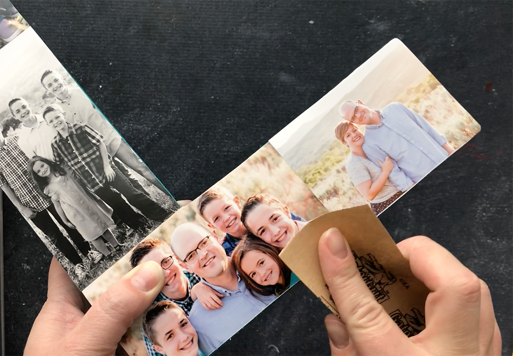 Hand sanding the edges of the photos