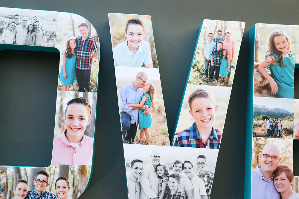 Closeup of a paper mache letter covered in photos