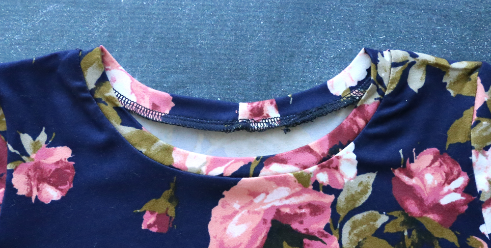 Dress neckline finished with binding