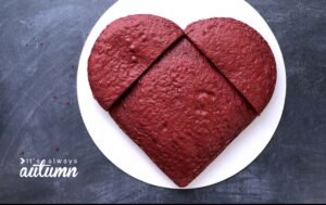 Heart shaped cake made from square cake and round cake cut in half.